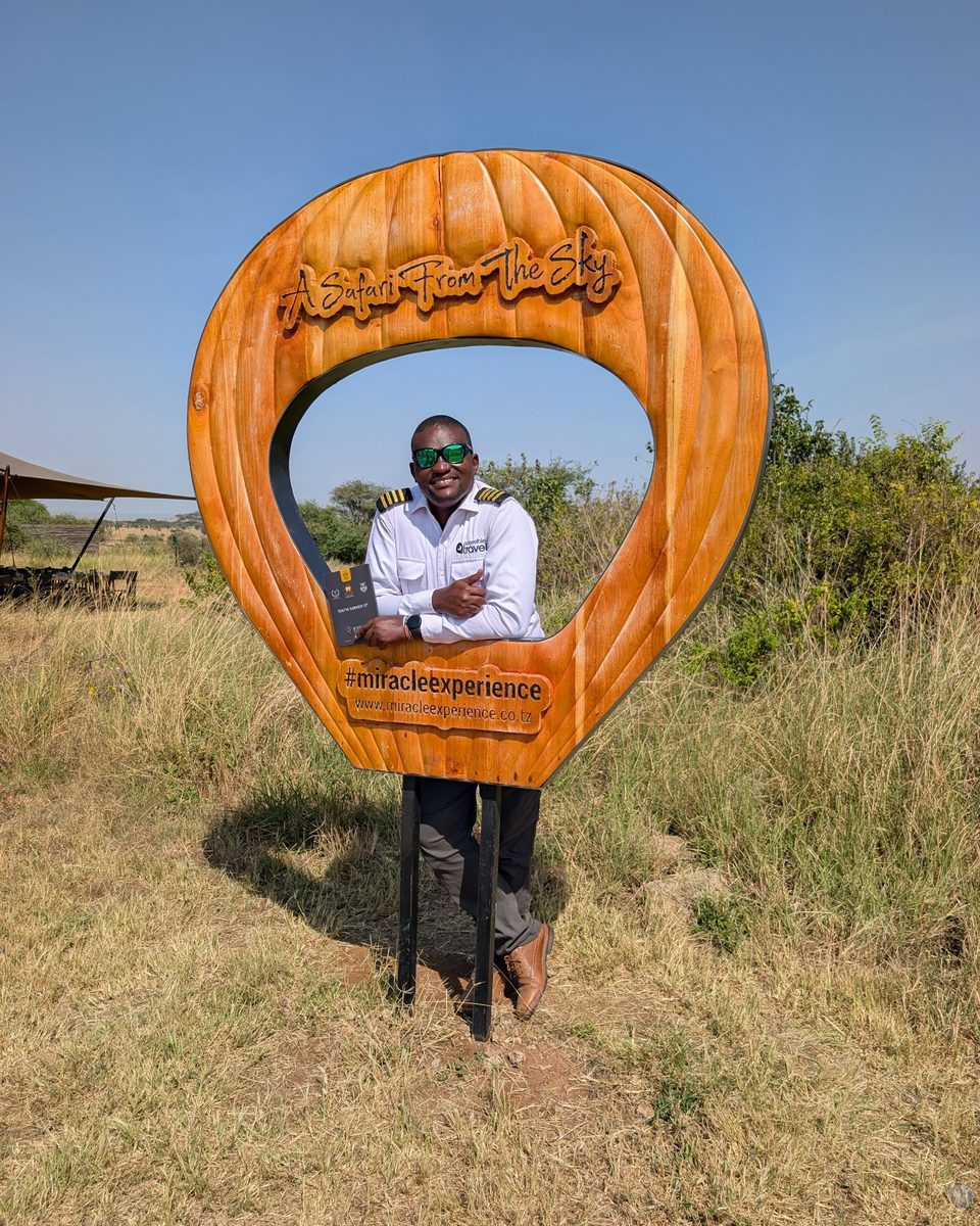 Accessible Travel team at the Miracle Experience balloon frame in the Serengeti
